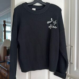 A new Day sweater with out of officer embroidery